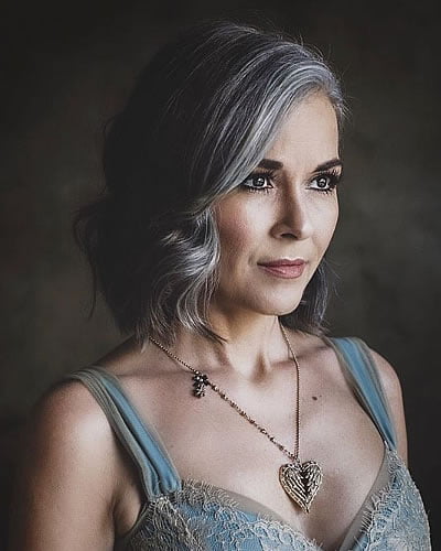 Short bob hair cut for older women with gray balayage hair