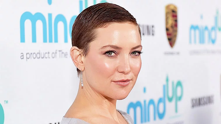 Very short pixie hair cut for women with round face