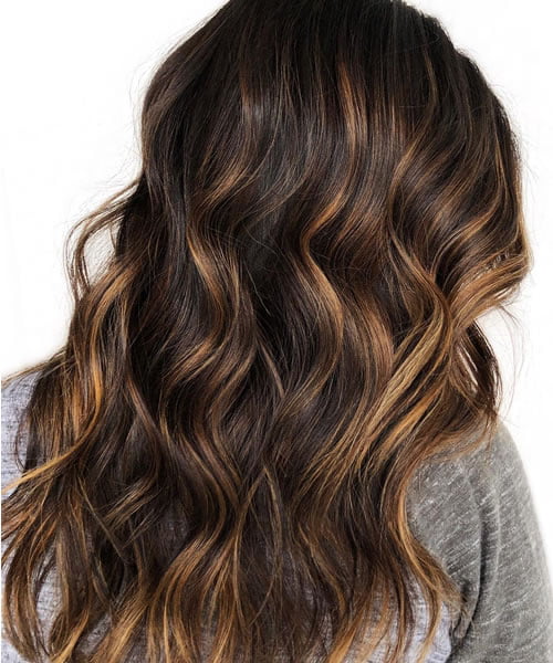 dark brown hair with highlights