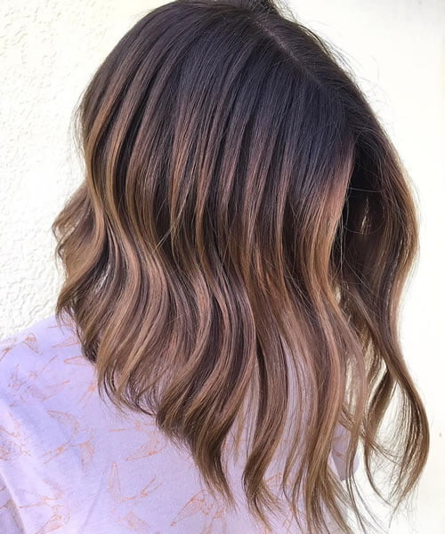 wavy lob with caramel balayage